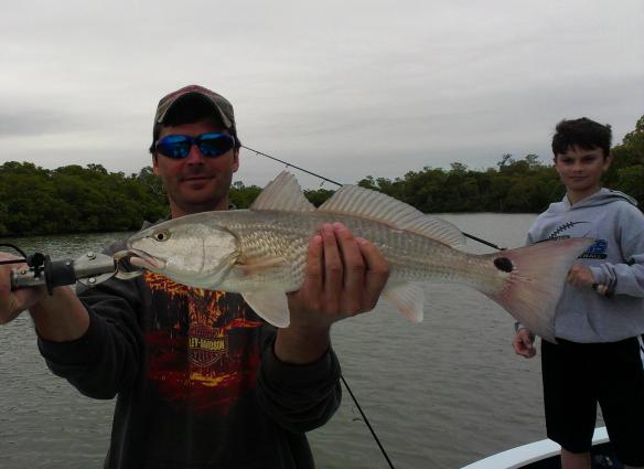 A nice redfish comes aboard while fishing with Capt. Ben Geroy on 1/1/2013