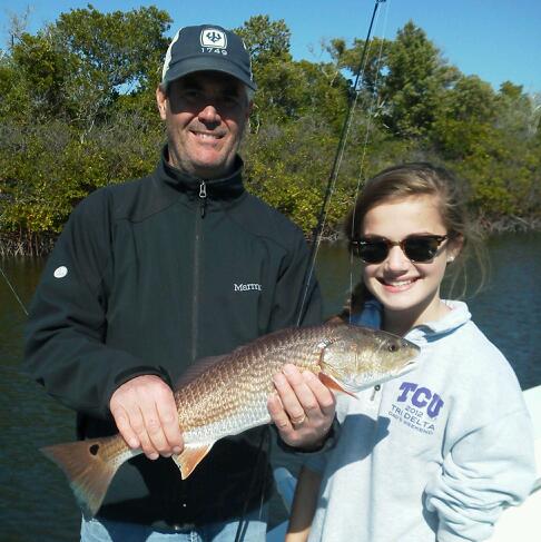 Barrett Gilbert and daughter Mary Harbin with another red on a cool afternoon last week