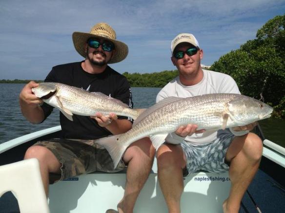 Capt. Ben Geroy and Nick Hamilton with a double on some nice July redfish released last week!
