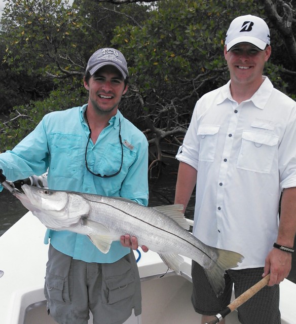 Neil Henges proudly shows off his 15 lb. snook before release on 6/10/14